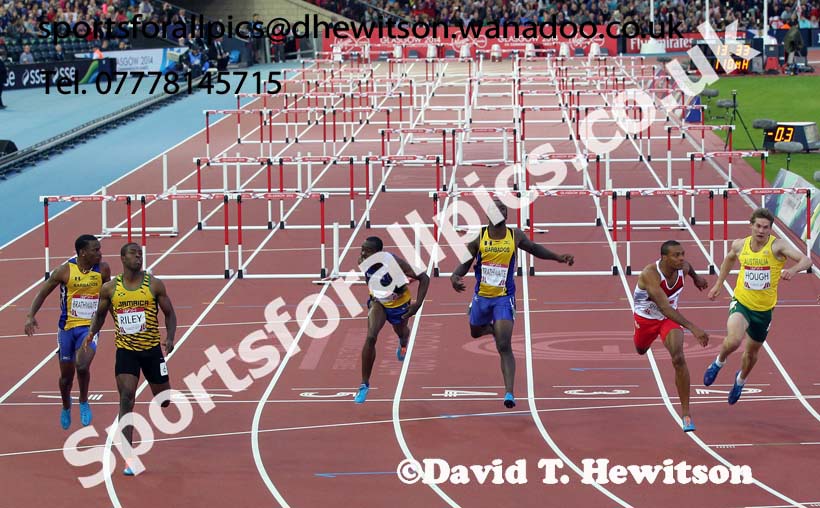 Andrew Riley (Jamaica) wins the 110 metres hurdles from Will Sharman (England) at the Commonwealth Games, Glasgow. Photo: David T. Hewitson/Sports for All Pics